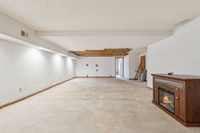 Welcome to this beautifully updated 3-bedroom, 2-bathroom home on Woods Edge Golf Course in Iowa - for sale on GolfHomes.com, golf home, golf lot
