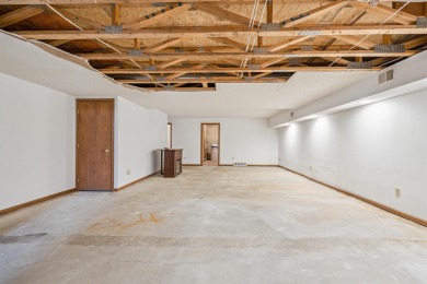 Welcome to this beautifully updated 3-bedroom, 2-bathroom home on Woods Edge Golf Course in Iowa - for sale on GolfHomes.com, golf home, golf lot