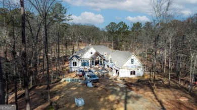 Introducing a New Construction luxurious custom home nestled in on Reynolds Lake Oconee - The Oconee in Georgia - for sale on GolfHomes.com, golf home, golf lot