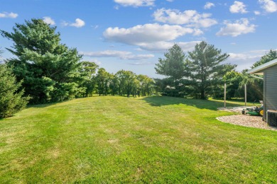 Welcome to this beautifully updated 3-bedroom, 2-bathroom home on Woods Edge Golf Course in Iowa - for sale on GolfHomes.com, golf home, golf lot