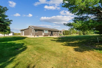 Welcome to this beautifully updated 3-bedroom, 2-bathroom home on Woods Edge Golf Course in Iowa - for sale on GolfHomes.com, golf home, golf lot