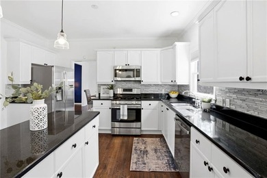 Welcome to this exceptional golf course estate in the highly on Towne Lake Hills Golf Club in Georgia - for sale on GolfHomes.com, golf home, golf lot