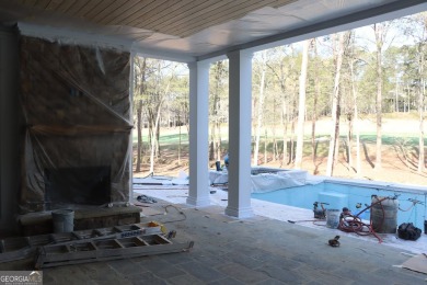 Introducing a New Construction luxurious custom home nestled in on Reynolds Lake Oconee - The Oconee in Georgia - for sale on GolfHomes.com, golf home, golf lot