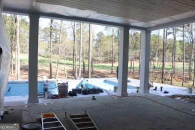 Introducing a New Construction luxurious custom home nestled in on Reynolds Lake Oconee - The Oconee in Georgia - for sale on GolfHomes.com, golf home, golf lot