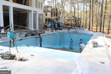 Introducing a New Construction luxurious custom home nestled in on Reynolds Lake Oconee - The Oconee in Georgia - for sale on GolfHomes.com, golf home, golf lot