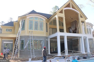 Introducing a New Construction luxurious custom home nestled in on Reynolds Lake Oconee - The Oconee in Georgia - for sale on GolfHomes.com, golf home, golf lot