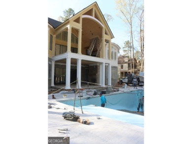 Introducing a New Construction luxurious custom home nestled in on Reynolds Lake Oconee - The Oconee in Georgia - for sale on GolfHomes.com, golf home, golf lot