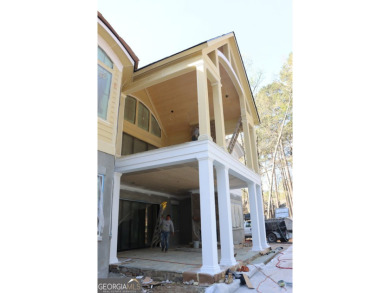 Introducing a New Construction luxurious custom home nestled in on Reynolds Lake Oconee - The Oconee in Georgia - for sale on GolfHomes.com, golf home, golf lot