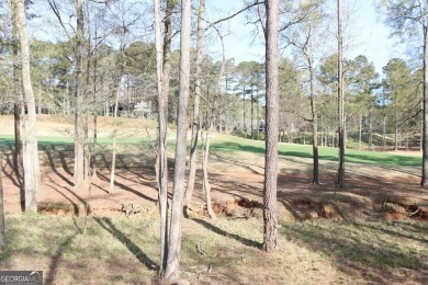 Introducing a New Construction luxurious custom home nestled in on Reynolds Lake Oconee - The Oconee in Georgia - for sale on GolfHomes.com, golf home, golf lot