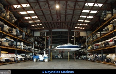 Introducing a New Construction luxurious custom home nestled in on Reynolds Lake Oconee - The Oconee in Georgia - for sale on GolfHomes.com, golf home, golf lot