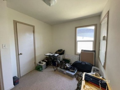 This property is located in a southside residential area close on Miles City Town and Country Club in Montana - for sale on GolfHomes.com, golf home, golf lot
