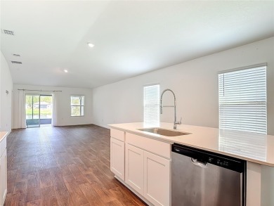 This nearly NEW 3-bedroom, 2-bath Berkeley floorplan offers 1 on Grand Reserve Golf Course in Florida - for sale on GolfHomes.com, golf home, golf lot