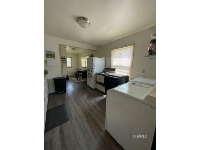 This property is located in a southside residential area close on Miles City Town and Country Club in Montana - for sale on GolfHomes.com, golf home, golf lot