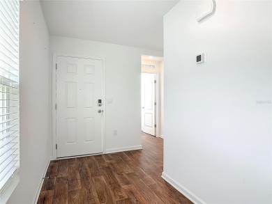 This nearly NEW 3-bedroom, 2-bath Berkeley floorplan offers 1 on Grand Reserve Golf Course in Florida - for sale on GolfHomes.com, golf home, golf lot