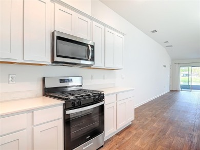 This nearly NEW 3-bedroom, 2-bath Berkeley floorplan offers 1 on Grand Reserve Golf Course in Florida - for sale on GolfHomes.com, golf home, golf lot