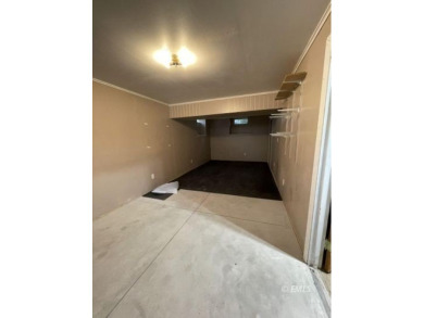 This property is located in a southside residential area close on Miles City Town and Country Club in Montana - for sale on GolfHomes.com, golf home, golf lot