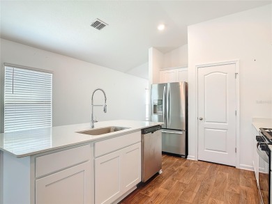 This nearly NEW 3-bedroom, 2-bath Berkeley floorplan offers 1 on Grand Reserve Golf Course in Florida - for sale on GolfHomes.com, golf home, golf lot