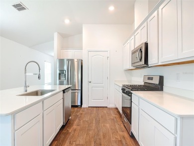 This nearly NEW 3-bedroom, 2-bath Berkeley floorplan offers 1 on Grand Reserve Golf Course in Florida - for sale on GolfHomes.com, golf home, golf lot