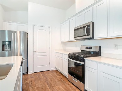 This nearly NEW 3-bedroom, 2-bath Berkeley floorplan offers 1 on Grand Reserve Golf Course in Florida - for sale on GolfHomes.com, golf home, golf lot