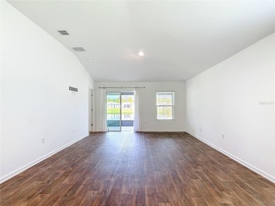 This nearly NEW 3-bedroom, 2-bath Berkeley floorplan offers 1 on Grand Reserve Golf Course in Florida - for sale on GolfHomes.com, golf home, golf lot