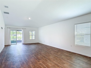 This nearly NEW 3-bedroom, 2-bath Berkeley floorplan offers 1 on Grand Reserve Golf Course in Florida - for sale on GolfHomes.com, golf home, golf lot