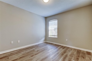 This beautifully maintained and move in ready home tucked away on Imperial Lakewoods Golf Club in Florida - for sale on GolfHomes.com, golf home, golf lot