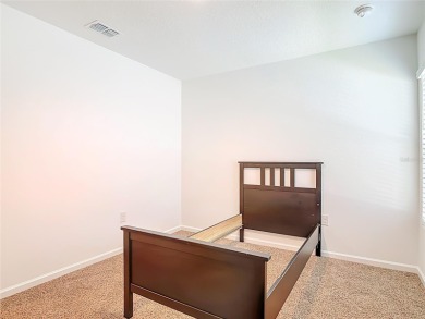 This nearly NEW 3-bedroom, 2-bath Berkeley floorplan offers 1 on Grand Reserve Golf Course in Florida - for sale on GolfHomes.com, golf home, golf lot