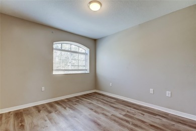 This beautifully maintained and move in ready home tucked away on Imperial Lakewoods Golf Club in Florida - for sale on GolfHomes.com, golf home, golf lot