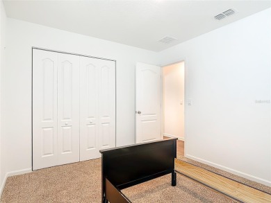 This nearly NEW 3-bedroom, 2-bath Berkeley floorplan offers 1 on Grand Reserve Golf Course in Florida - for sale on GolfHomes.com, golf home, golf lot