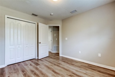 This beautifully maintained and move in ready home tucked away on Imperial Lakewoods Golf Club in Florida - for sale on GolfHomes.com, golf home, golf lot