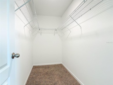 This nearly NEW 3-bedroom, 2-bath Berkeley floorplan offers 1 on Grand Reserve Golf Course in Florida - for sale on GolfHomes.com, golf home, golf lot