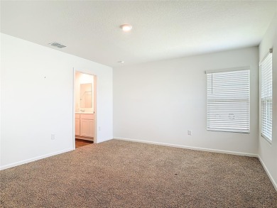 This nearly NEW 3-bedroom, 2-bath Berkeley floorplan offers 1 on Grand Reserve Golf Course in Florida - for sale on GolfHomes.com, golf home, golf lot