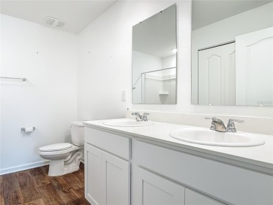 This nearly NEW 3-bedroom, 2-bath Berkeley floorplan offers 1 on Grand Reserve Golf Course in Florida - for sale on GolfHomes.com, golf home, golf lot