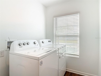 This nearly NEW 3-bedroom, 2-bath Berkeley floorplan offers 1 on Grand Reserve Golf Course in Florida - for sale on GolfHomes.com, golf home, golf lot