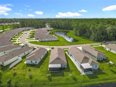 This nearly NEW 3-bedroom, 2-bath Berkeley floorplan offers 1 on Grand Reserve Golf Course in Florida - for sale on GolfHomes.com, golf home, golf lot
