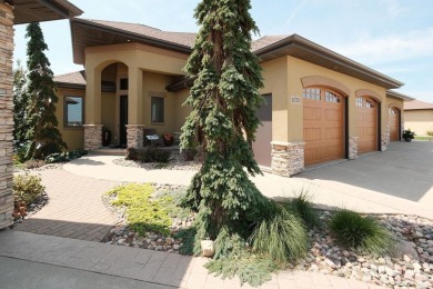 Exquisite design features, functional and luxurious living on The Ridge Golf Club in Iowa - for sale on GolfHomes.com, golf home, golf lot