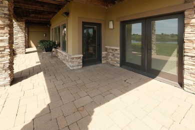 Exquisite design features, functional and luxurious living on The Ridge Golf Club in Iowa - for sale on GolfHomes.com, golf home, golf lot
