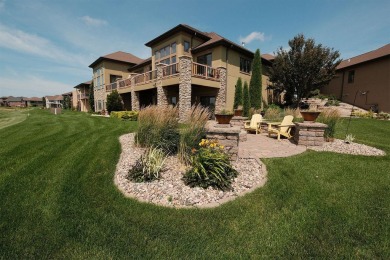 Exquisite design features, functional and luxurious living on The Ridge Golf Club in Iowa - for sale on GolfHomes.com, golf home, golf lot