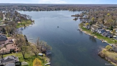 LAKE LIVING AT ITS FINEST ON PRIVATE - ALL SPORTS - LOWER on Edgewood Country Club in Michigan - for sale on GolfHomes.com, golf home, golf lot