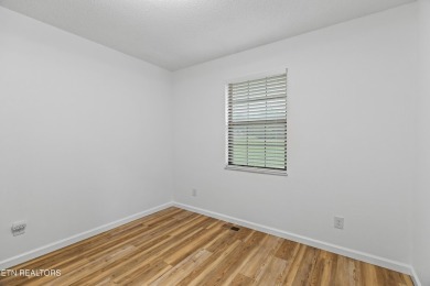 Endless possibilities await with this charming 2 bed/1 bath home on Dandridge Golf and Country Club in Tennessee - for sale on GolfHomes.com, golf home, golf lot