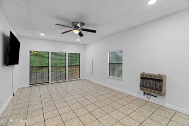 Endless possibilities await with this charming 2 bed/1 bath home on Dandridge Golf and Country Club in Tennessee - for sale on GolfHomes.com, golf home, golf lot