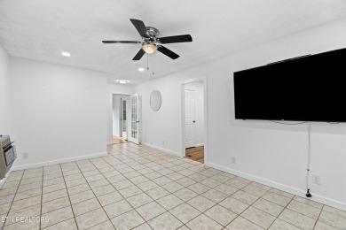 Endless possibilities await with this charming 2 bed/1 bath home on Dandridge Golf and Country Club in Tennessee - for sale on GolfHomes.com, golf home, golf lot