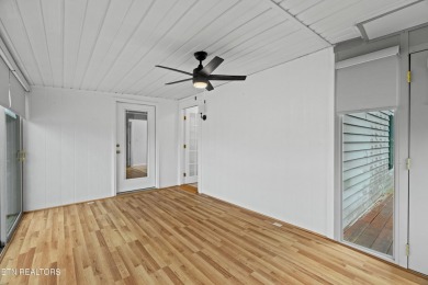 Endless possibilities await with this charming 2 bed/1 bath home on Dandridge Golf and Country Club in Tennessee - for sale on GolfHomes.com, golf home, golf lot