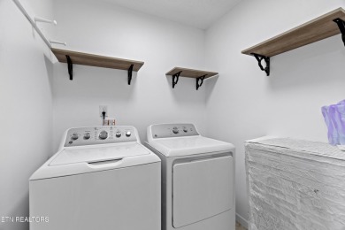 Endless possibilities await with this charming 2 bed/1 bath home on Dandridge Golf and Country Club in Tennessee - for sale on GolfHomes.com, golf home, golf lot