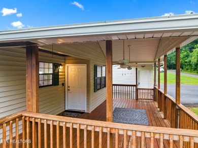 Endless possibilities await with this charming 2 bed/1 bath home on Dandridge Golf and Country Club in Tennessee - for sale on GolfHomes.com, golf home, golf lot