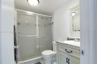 Beautifully renovated 2-bed, 2-bath condo with a modern on Palm-Aire Country Club and Resort - The Oaks in Florida - for sale on GolfHomes.com, golf home, golf lot