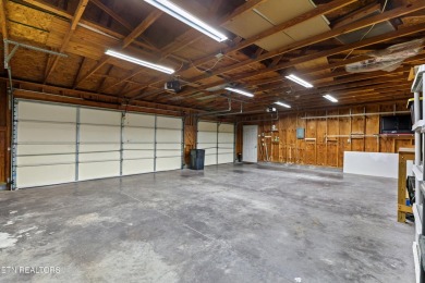Endless possibilities await with this charming 2 bed/1 bath home on Dandridge Golf and Country Club in Tennessee - for sale on GolfHomes.com, golf home, golf lot