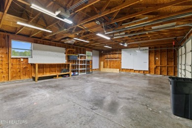 Endless possibilities await with this charming 2 bed/1 bath home on Dandridge Golf and Country Club in Tennessee - for sale on GolfHomes.com, golf home, golf lot