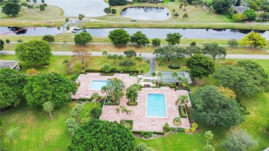 Beautifully renovated 2-bed, 2-bath condo with a modern on Palm-Aire Country Club and Resort - The Oaks in Florida - for sale on GolfHomes.com, golf home, golf lot