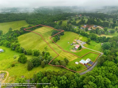 Endless possibilities await with this charming 2 bed/1 bath home on Dandridge Golf and Country Club in Tennessee - for sale on GolfHomes.com, golf home, golf lot